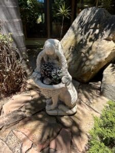 Vintage-Concrete-Dog-with-Basket-Statue