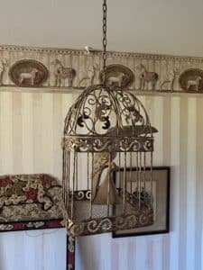 Vintage-Ornate-Metal-Birdcage-with-Bird-Figure-fourth-image