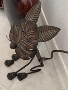 Whimsical-Metal-Leaf-Face-Cat-Sculpture-second-image