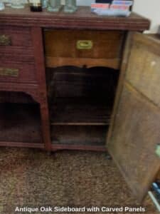 Antique-Oak-Sideboard-with-Carved-Panels-fifth-image