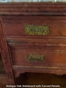 Antique-Oak-Sideboard-with-Carved-Panels-third-image