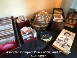Assorted-Compact-Discs-CDs-and-Portable-CD-Player