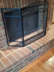Black-Metal-Fireplace-Screen-with-Arched-Top
