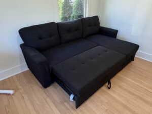 Black-Upholstered-Sectional-Sofa-with-Pull-Out-Bed-and-Storage-Chaise-third-image