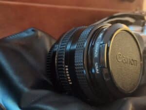 Canon-AV-mm-Film-Camera-with-Canon-FD-mm-f-or-.-Lens-and-Leather-Bag-third-image