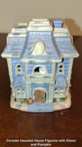 Ceramic-Haunted-House-Figurine-with-Ghost-and-Pumpkin