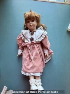 Collection-of-Three-Porcelain-Dolls
