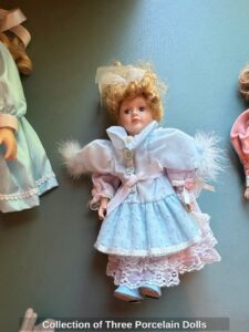 Collection-of-Three-Porcelain-Dolls-second-image