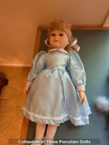 Collection-of-Three-Porcelain-Dolls-third-image