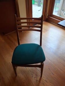 Danish-Teak-Extendable-Dining-Table-with-Chairs-and-Assorted-Tableware-fifth-image