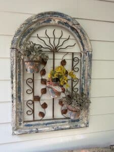 Distressed-Arched-Window-Wall-Decor-with-Triple-Planters