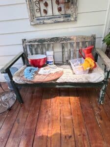 Distressed-Green-Wooden-Garden-Bench-with-Decorative-Back