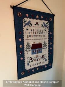Embroidered-Alphabet-and-House-Sampler-Wall-Hanging