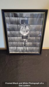 Framed-Black-and-White-Photograph-of-a-Gas-Lantern