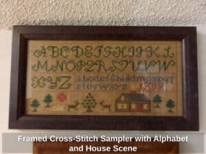 Framed-Cross-Stitch-Sampler-with-Alphabet-and-House-Scene