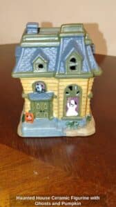 Haunted-House-Ceramic-Figurine-with-Ghosts-and-Pumpkin