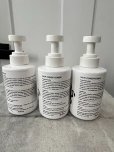 Juicy-Couture-S-and-C-Logo-Shampoo-and-Conditioner-Bottles-second-image