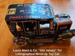 Louis-Marx-Co.-Old-Jalopy-Tin-Lithographed-Wind-Up-Toy-Car-second-image