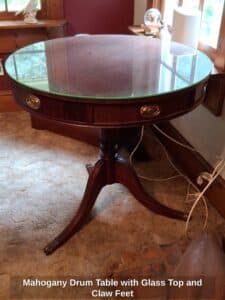 Mahogany-Drum-Table-with-Glass-Top-and-Claw-Feet