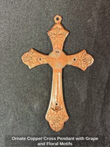 Ornate-Copper-Cross-Pendant-with-Grape-and-Floral-Motifs