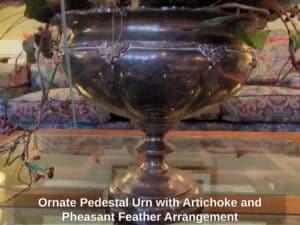 Ornate-Pedestal-Urn-with-Artichoke-and-Pheasant-Feather-Arrangement-second-image