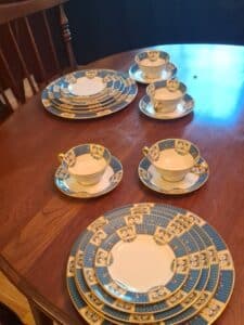 Porcelain-Teacup-and-Saucer-Set-with-Blue-and-Gold-Trim-fourth-image