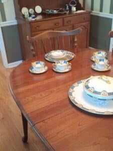 Porcelain-Teacup-and-Saucer-Set-with-Blue-and-Gold-Trim-second-image