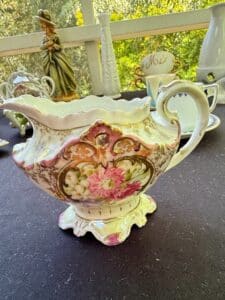 R.S.-Prussia-Porcelain-Creamer-with-Floral-Motif