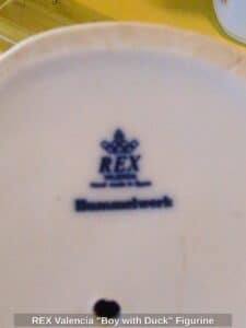 REX-Valencia-Boy-with-Duck-Figurine-second-image