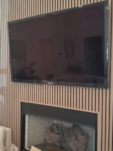 Samsung-Flat-Screen-Television-mounted-on-Wood-Slat-Wall-1