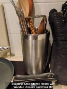 Stainless-Steel-Utensil-Holder-with-Wooden-Utensils-and-Oven-Mitt