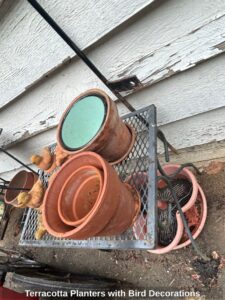 Terracotta-Planters-with-Bird-Decorations