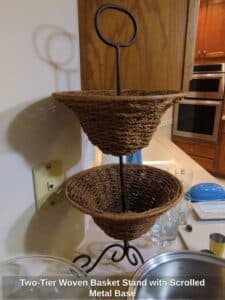 Two-Tier-Woven-Basket-Stand-with-Scrolled-Metal-Base