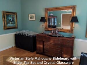Victorian-Style-Mahogany-Sideboard-with-Silver-Tea-Set-and-Crystal-Glassware