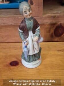 Vintage-Ceramic-Figurine-of-an-Elderly-Woman-with-Umbrella-Homco
