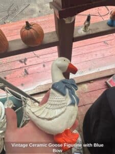 Vintage-Ceramic-Goose-Figurine-with-Blue-Bow