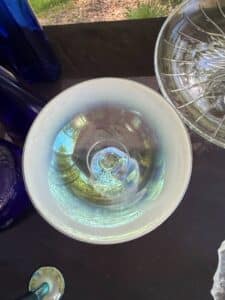 Vintage-Clear-Pressed-Glass-Six-Point-Star-Pedestal-Cake-Stand-and-Vintage-Iridescent-Glass-Pedestal-Cake-Stand-second-image