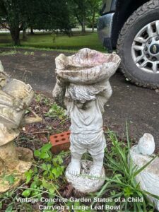 Vintage-Concrete-Garden-Statue-of-a-Child-Carrying-a-Large-Leaf-Bowl-second-image