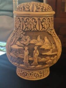 Vintage-Ivory-Dynasty-Carved-Resin-Lidded-Vase-with-Figural-and-Landscape-Scenes