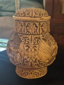 Vintage-Ivory-Dynasty-Carved-Resin-Lidded-Vase-with-Figural-and-Landscape-Scenes-second-image