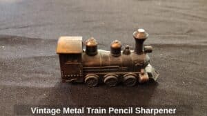Vintage-Metal-Train-Pencil-Sharpener-second-image