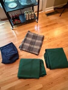 Vintage-Plaid-Wool-Blanket-and-Dark-Green-Fleece-Blankets