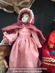 Vintage-Porcelain-Head-Doll-with-Pink-Polka-Dot-Dress-and-Bonnet