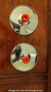Vintage-Pot-Lids-with-Orange-Knobs