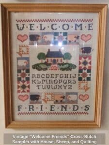 Vintage-Welcome-Friends-Cross-Stitch-Sampler-with-House-Sheep-and-Quilting-Motifs