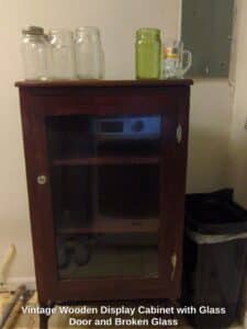 Vintage-Wooden-Display-Cabinet-with-Glass-Door-and-Broken-Glass