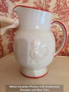 White-Ceramic-Pitcher-with-Embossed-Rooster-and-Red-Trim