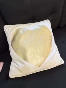 White-Heart-Shaped-Throw-Pillow-with-Metallic-Gold-Heart-Appliqu