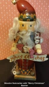 Wooden-Nutcracker-with-Merry-Christmas-Banner