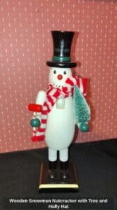 Wooden-Snowman-Nutcracker-with-Tree-and-Holly-Hat